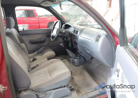 1999 Toyota Tacoma from USA, damaged, VIN 4TAVL52N7XZ419404